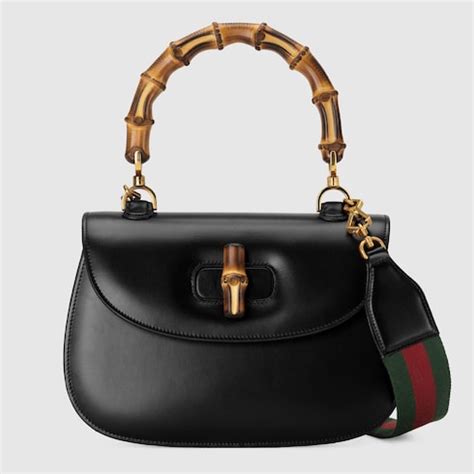 gucci bamboo tassel crossbody|Gucci bamboo bag 1947.